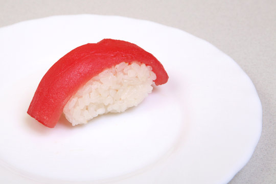 Sushi. Shka, kunsei, magura. Sashimi Unagi. Japanese food on a beautiful dish. Dietary food. An exquisite Japanese dish.