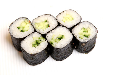 Roll with cucumber. Vegetarian food. Sushi in the nori. Japanese food on a beautiful dish.