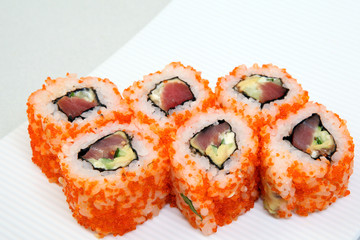 Sushi. Rolls with shrimp. Roll California with avocado. Japanese food. Healthy food is nicely laid out on a platter.