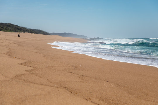 South African Beach With Fisherman