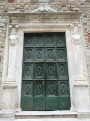 Fototapeta premium Italy, Sarzana, portal of the parish of St Andrew