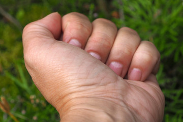 Hand female close-up. Movements and gestures with your fingers. 