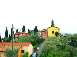 View of typical colorful houses from the fortress of Sarzanello, Italy