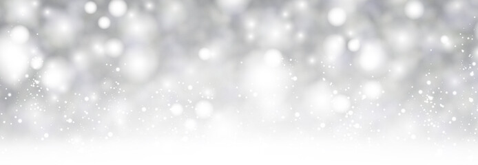 Grey shiny blurred winter banner with snow.