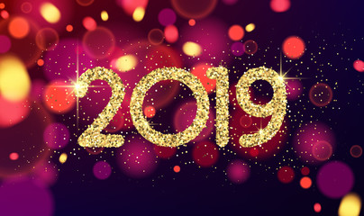 Golden shiny 2019 New Year sign on blurred background.