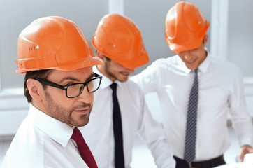 close up. a group of architects standing in the hall of the new building