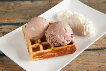 Ice cream waffle and whipped cream