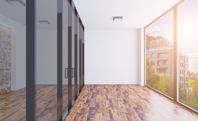 3D rendering. Business center. A modern empty office with large glass partitions on the background of a panoramic window. Meeting room. Sunset.