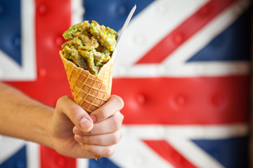 Chicken in waffle cone with union jack flag background