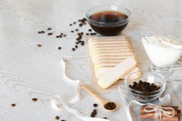 Tiramisu ingredients for preparing the cake. Top view with copy space