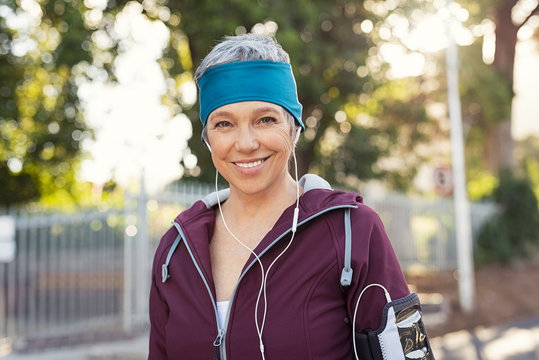 Happy senior fitness woman outdoor