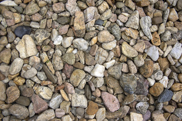 Group of pebbles, light colors, stone background, round and smooth pebbles, simple and harmony texture