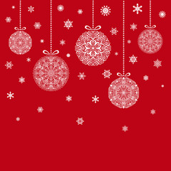 Christmas Balls hanging on red background snowflakes