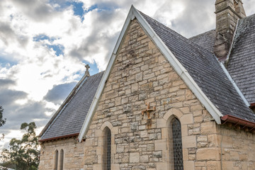 Close up view of sandstone church in country setting