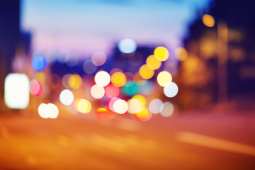Trafficlights in the city at night time. Urban road view with beautiful bokeh