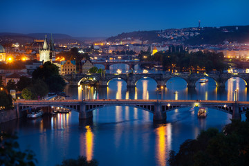 Fototapeta na wymiar Illuminated bridges in Praha