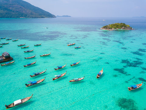High aerial overview of entire tropical Thai island of Ko Lipe and Andman Sea in Thailand