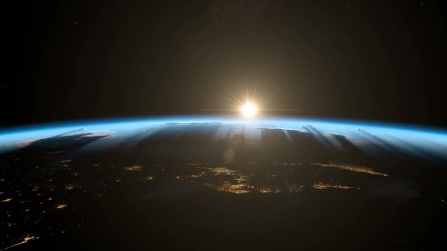Sunrise from space. Earth from space. Version 2018. Beautiful atmospheric sunrise from Earth orbit. Realistic clouds and atmosphere. View from ISS. Contains space, sun, world, planet. Sat Img by NASA.