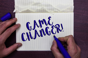 Writing note showing Game Changer. Business photo showcasing Sports Data Scorekeeper Gamestreams Live Scores Team Admins Man holding marker notebook page crumpled paper several tries mistakes