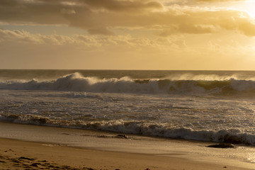 Fototapeta na wymiar Mandurah Beach Ocean Waves at sunset