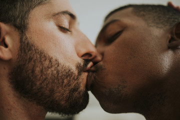 Passionate gay couple making out