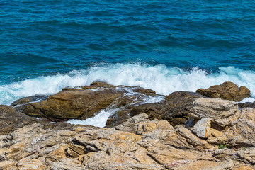Fototapeta na wymiar Rock and sea waves