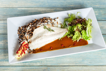 Steamed dorado fillet with crispy riсe