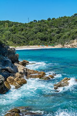 Fototapeta premium Olympiada, Greece - August 11, 2018: Proti Ammoudia beach, one of the most beautiful beaches in the Aegean Sea.