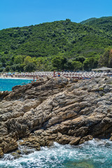 Fototapeta premium Olympiada, Greece - August 11, 2018: Proti Ammoudia beach, one of the most beautiful beaches in the Aegean Sea.