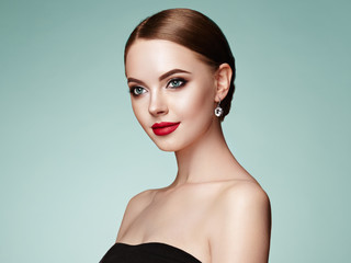 Beautiful Young Woman with Clean Fresh Skin. Perfect Makeup. Beauty Fashion. Eyelashes. Cosmetic Eyeshadow. Highlighting. Cosmetology, Beauty and Spa