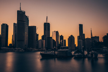 City port with skyscrapers in twilight