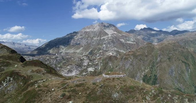 Aerial view of Airolo heading for the Gotthard Pass in Switzerland. Flight over an old army fortification from the Cold War