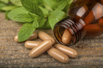 Capsules containing plant extracts, the concept of medicine based on natural ingredients. The...