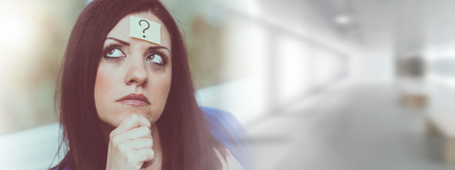 Young woman with question mark on her forehead - obrazy, fototapety, plakaty