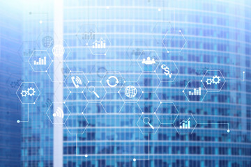 Double exposure mixed media. Diagrams and icons on hologram screen. Business people and modern city on background.