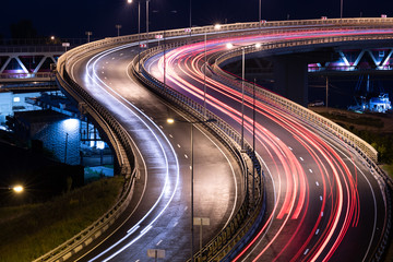 Road car light streaks. Night light painting stripes. Long exposure photography.