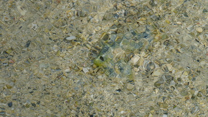 Reflet sous l'eau de galets polis, Rodrigues, Maurice