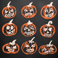 Halloween. A set of festive pumpkins. Color chalk on a blackboard. A collection of funny faces. Autumn holidays. Fun