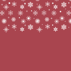 Schneeflocken auf rotem Hintergrund
