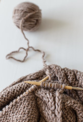 Fototapeta na wymiar Knitting as a hobby. Accessories for knitting.