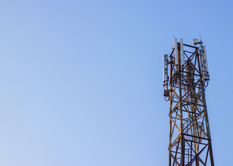 cellular antenna operators mobile phone, against the sky with a place under the text