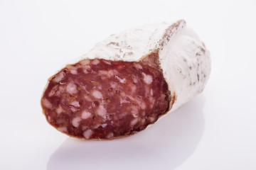 Saucisson sec delicious french salami on a white background