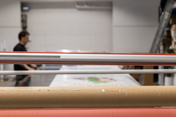 Big red laminator, printing machinery for press and advertising.