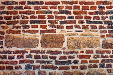 Old brick and stone fortress wall in Germany. Can be used as a background texture