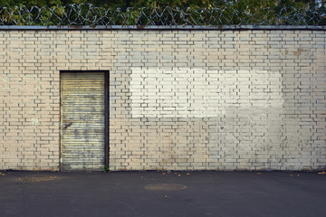 Obraz premium door in brick wall