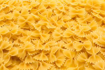 Close up pattern made of raw farfalle pasta
