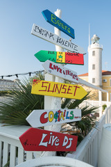 Colored signs on the beach