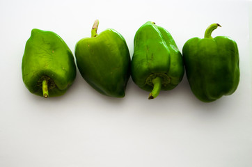 green pepper on white background