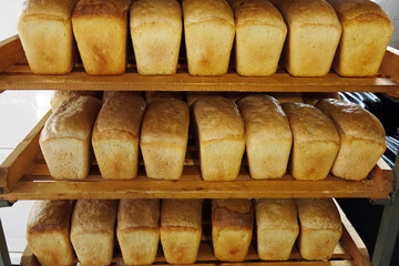 Fresh bread in the bakery. Healthy and nutritious food. The product contains carbohydrates.