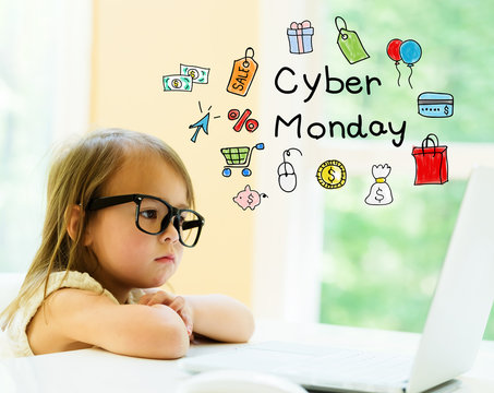 Cyber Monday text with little girl using her laptop